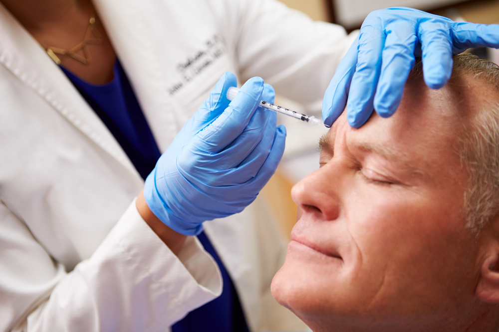 injecting mens head with botox