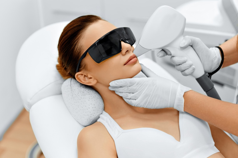 woman getting laser on face